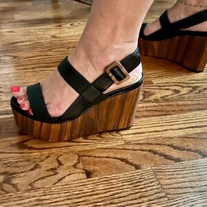 Jimmy Choo London Nazli Black Leather Wedge Sandals
Size: 38.5 (US 8)